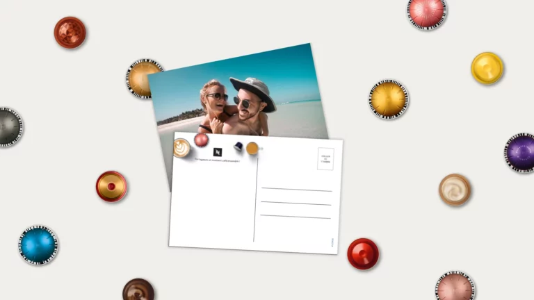 A printed photo postcard with Nespresso branding surrounded by colourful coffee capsules, symbolising the Summer Memories Photo Rewards campaign by Stampix.